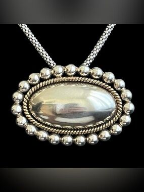 House of Laton Vintage Taxco Mexico Sterling silver and brass pendant Signed